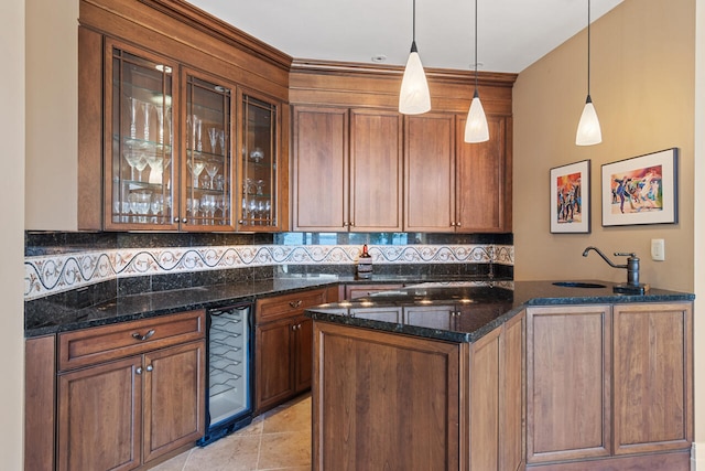 bar with light tile patterned floors, decorative backsplash, decorative light fixtures, beverage cooler, and dark stone counters