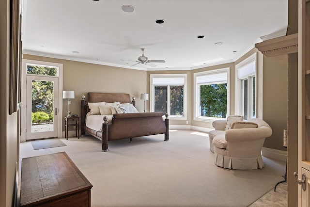 bedroom featuring crown molding, light carpet, access to exterior, and ceiling fan