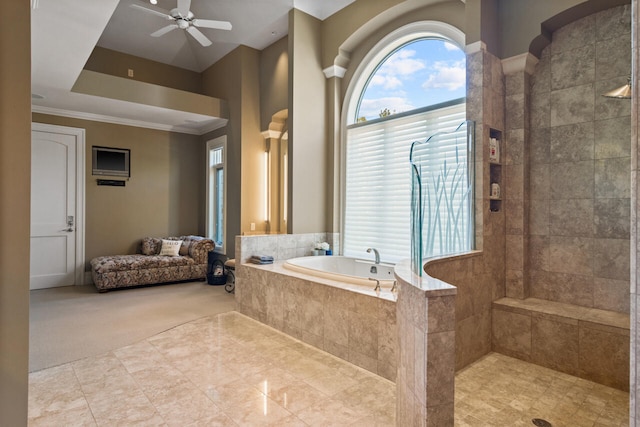 bathroom featuring ceiling fan, ornamental molding, and plus walk in shower