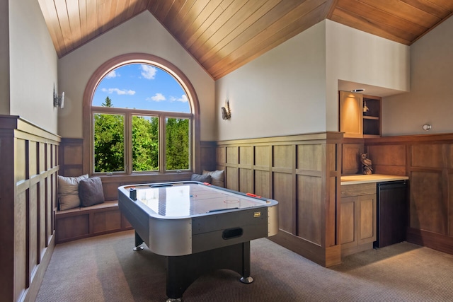 game room with vaulted ceiling, carpet floors, and wooden ceiling