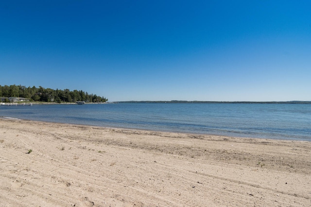 property view of water featuring a view of the beach