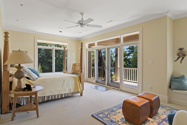 bedroom featuring ceiling fan, ornamental molding, access to exterior, and light colored carpet