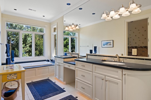 bathroom with crown molding, tile patterned flooring, and a tub