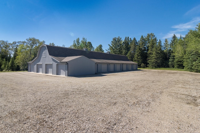 exterior space with an outbuilding