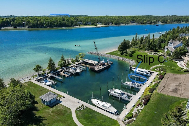 birds eye view of property featuring a water view