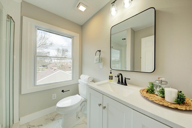 bathroom featuring toilet, tile flooring, and vanity