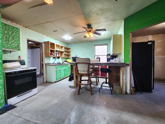 interior space featuring concrete floors, ceiling fan, and white range oven