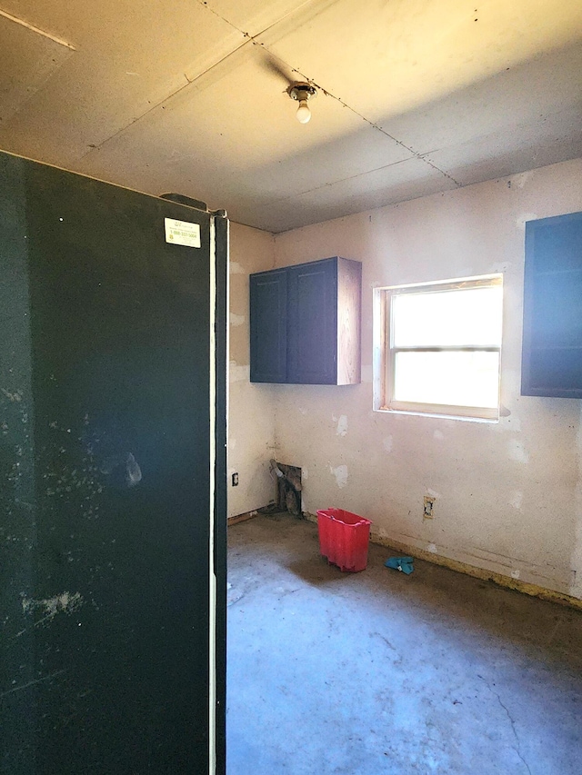 kitchen with concrete flooring