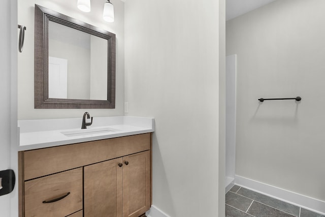 bathroom with vanity and tile patterned floors