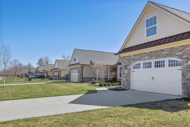 view of front of property with a front lawn and a garage