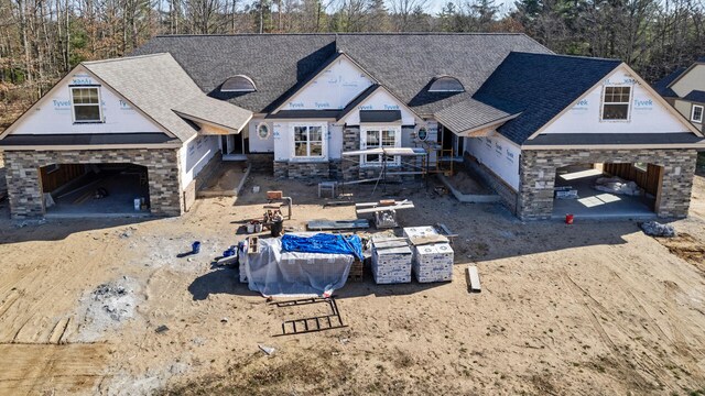 view of front of property with a garage