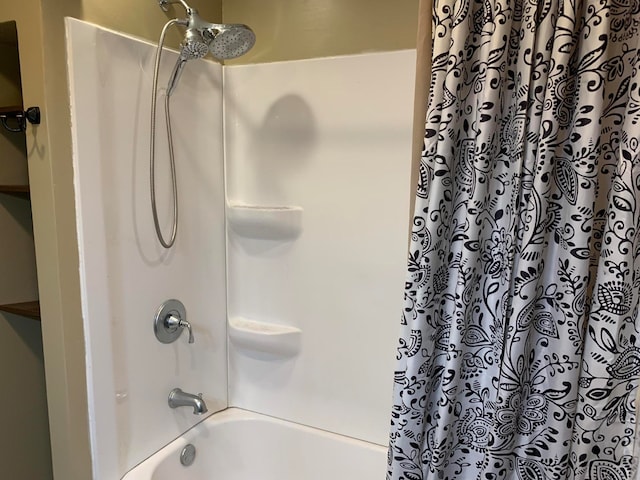 bathroom featuring shower / bath combination with curtain