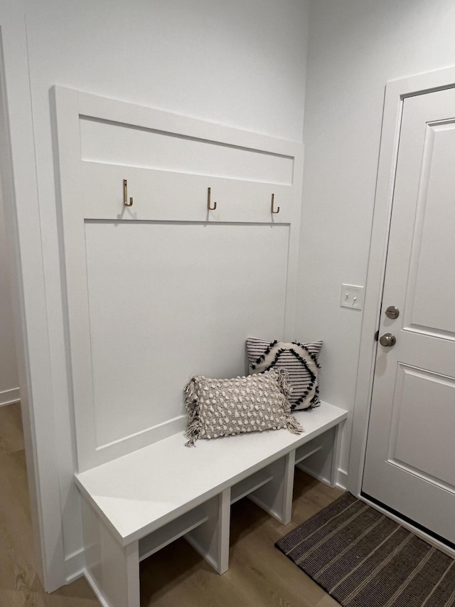 mudroom with wood-type flooring