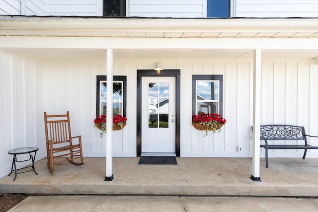 entrance to property with a porch