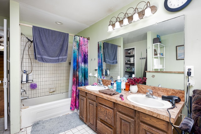 bathroom with double sink, shower / bathtub combination with curtain, tile flooring, and oversized vanity