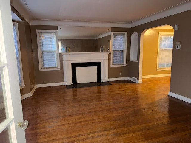 unfurnished living room with hardwood / wood-style flooring