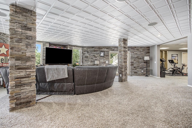 living room featuring ornate columns