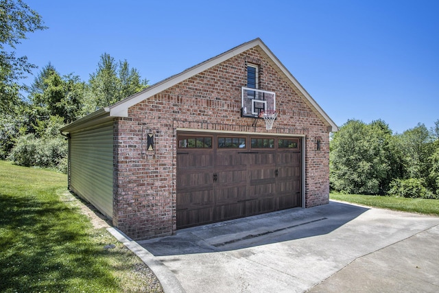 garage featuring a yard