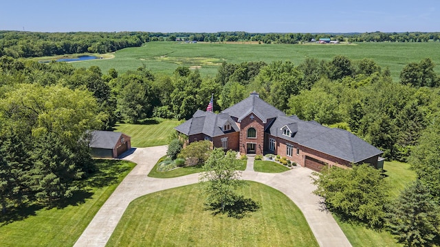 birds eye view of property with a rural view