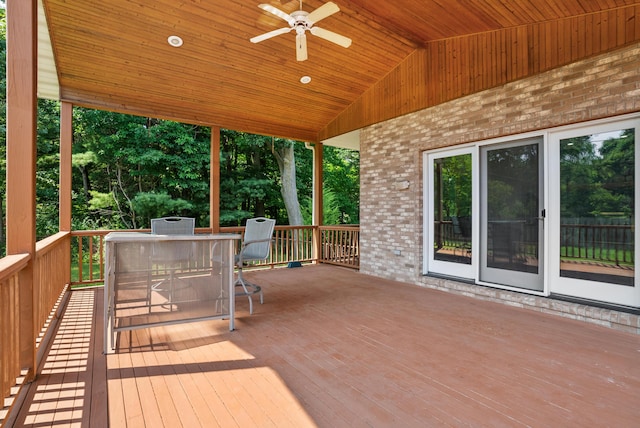 wooden deck featuring a ceiling fan