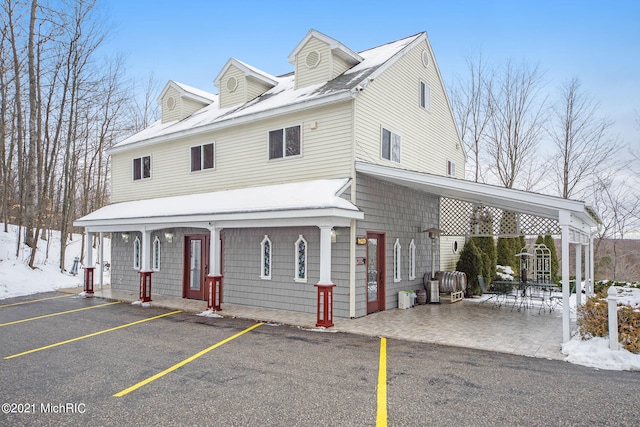 view of front of house with a carport