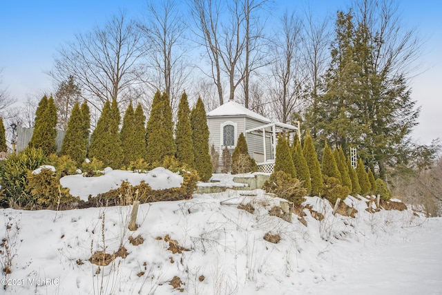 view of yard covered in snow