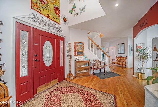 entryway with wood-type flooring