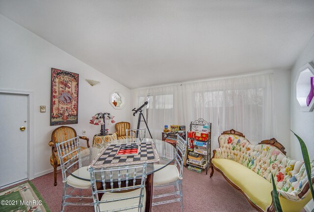 playroom featuring carpet flooring and lofted ceiling