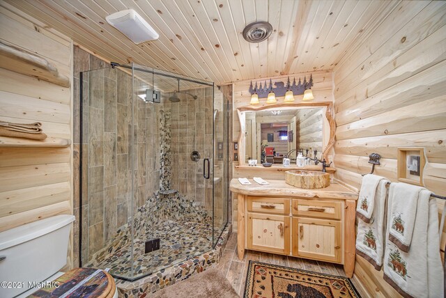 bathroom featuring oversized vanity, walk in shower, toilet, rustic walls, and wooden ceiling