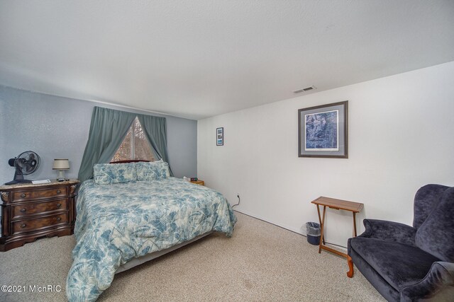 bedroom featuring carpet