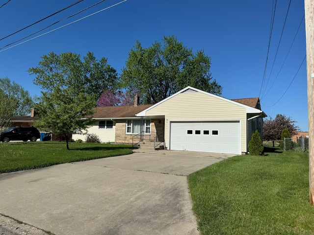 single story home with a front lawn and a garage