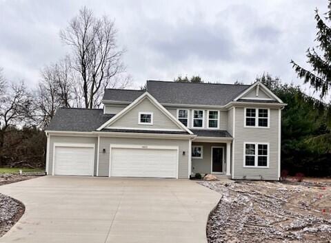 view of front of property with a garage