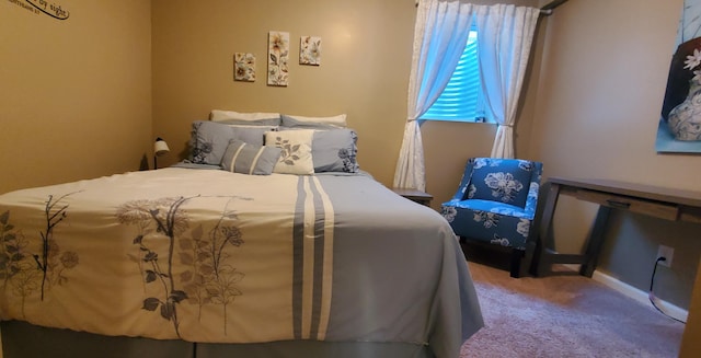 bedroom featuring carpet flooring