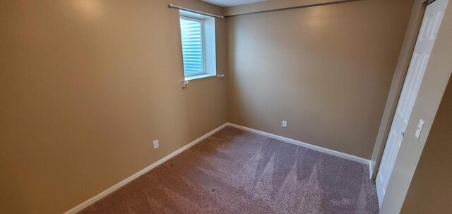 view of carpeted spare room