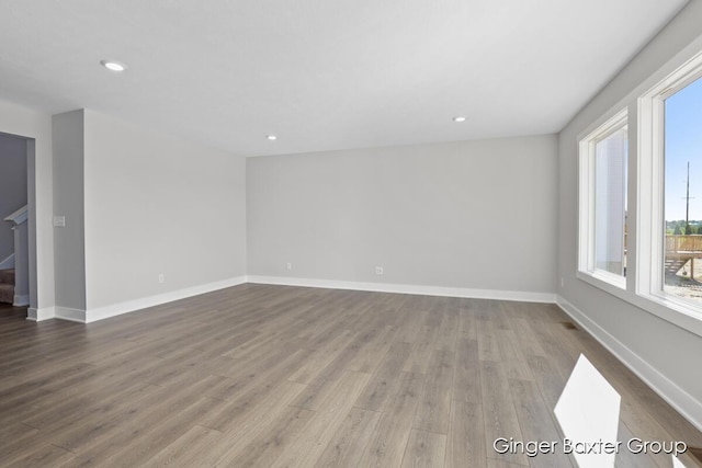 empty room with light wood-type flooring