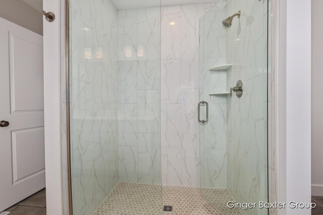 bathroom with an enclosed shower