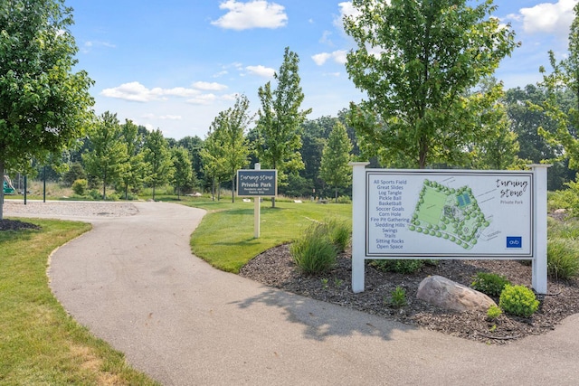 view of home's community with a lawn