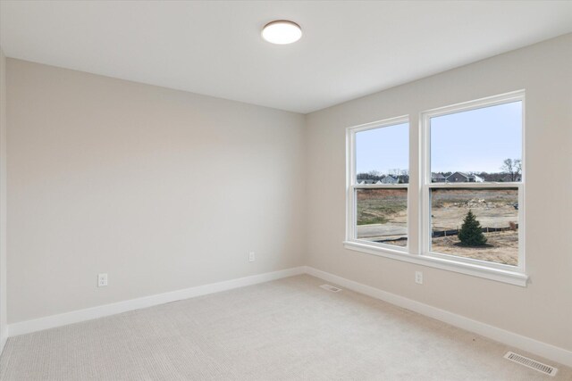 unfurnished room with carpet