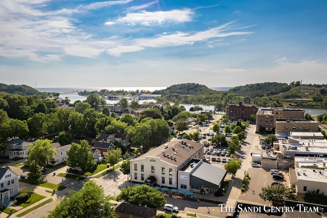 bird's eye view with a water view