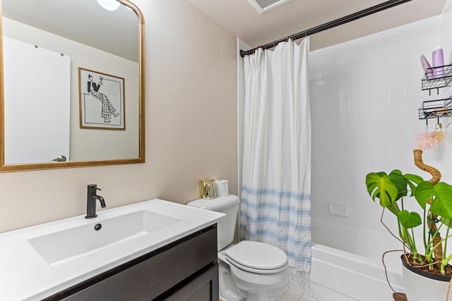 full bathroom with shower / bath combination with curtain, tile patterned floors, vanity, and toilet