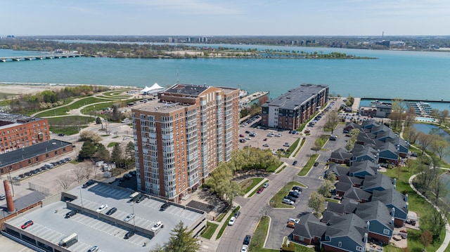 birds eye view of property featuring a water view