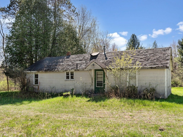 exterior space with a lawn