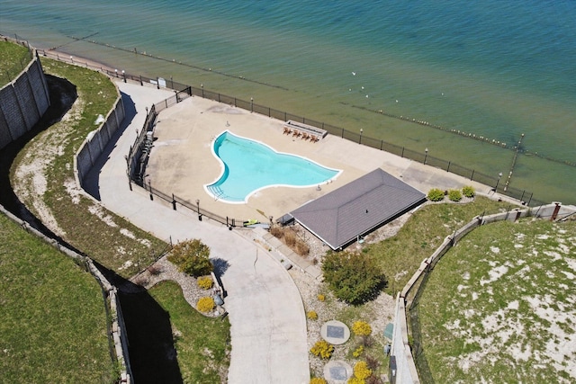 birds eye view of property featuring a water view