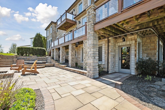 view of patio / terrace with a balcony