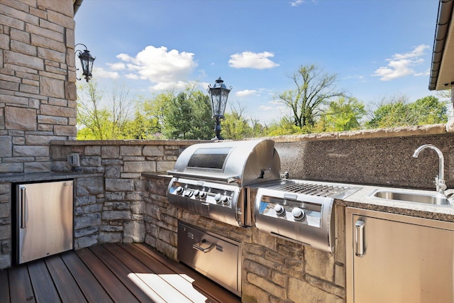 exterior space with sink and area for grilling