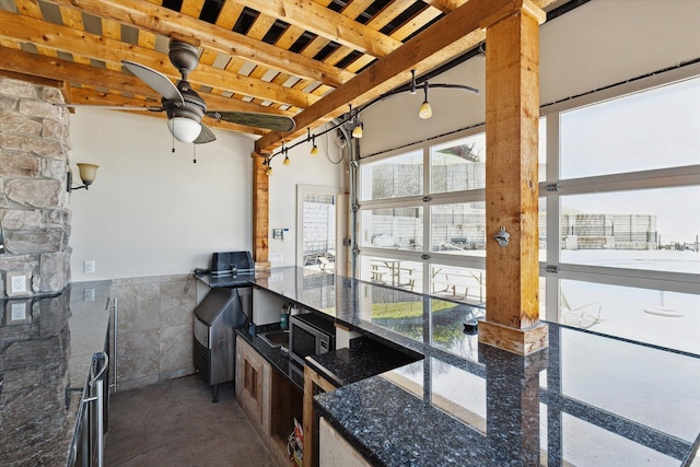 kitchen featuring ceiling fan