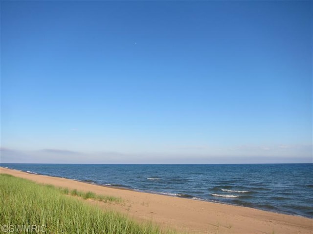 view of water feature featuring a beach view