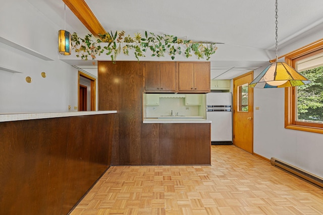 kitchen with hanging light fixtures, fridge, baseboard heating, beamed ceiling, and light parquet floors