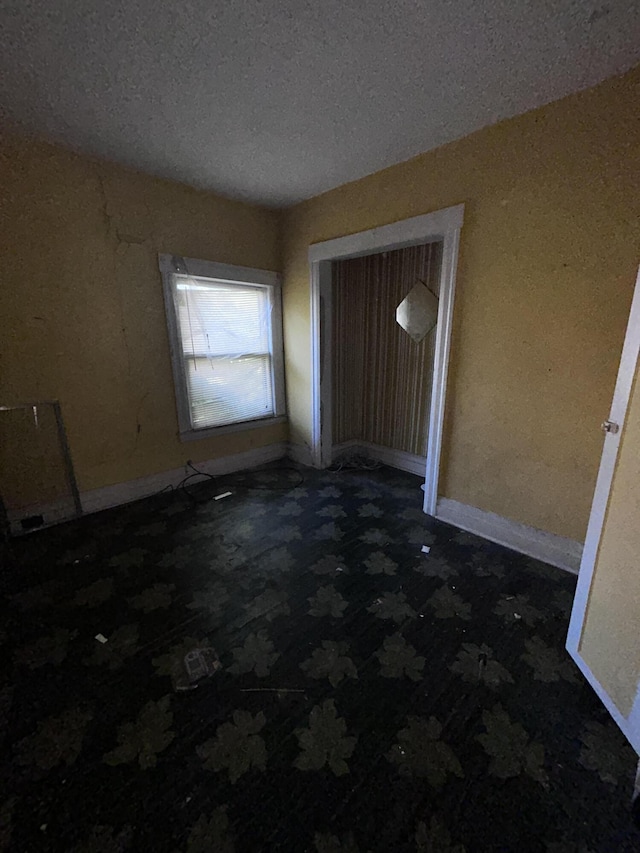 entrance foyer with a textured ceiling