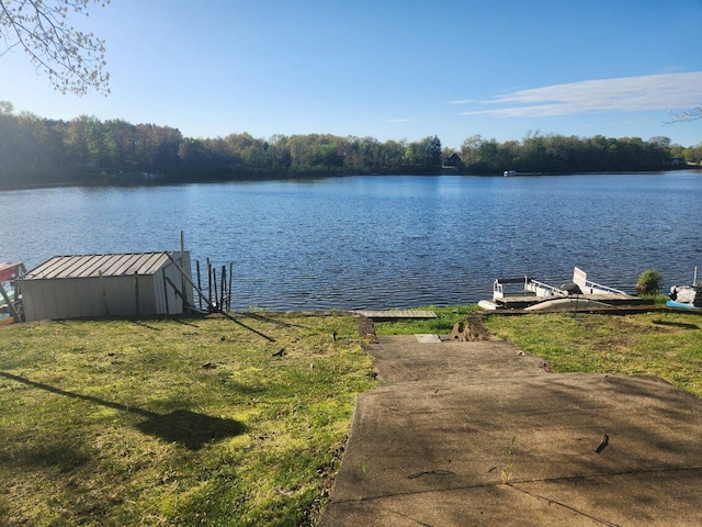 dock area with a water view